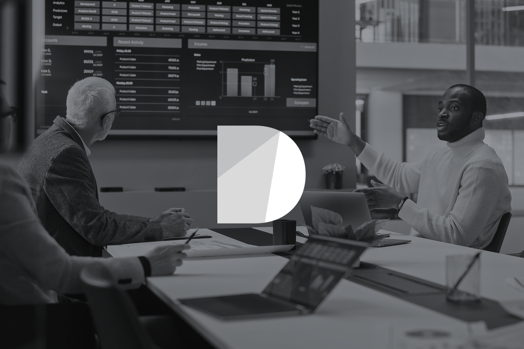 Modern office conference room with conversations occuring