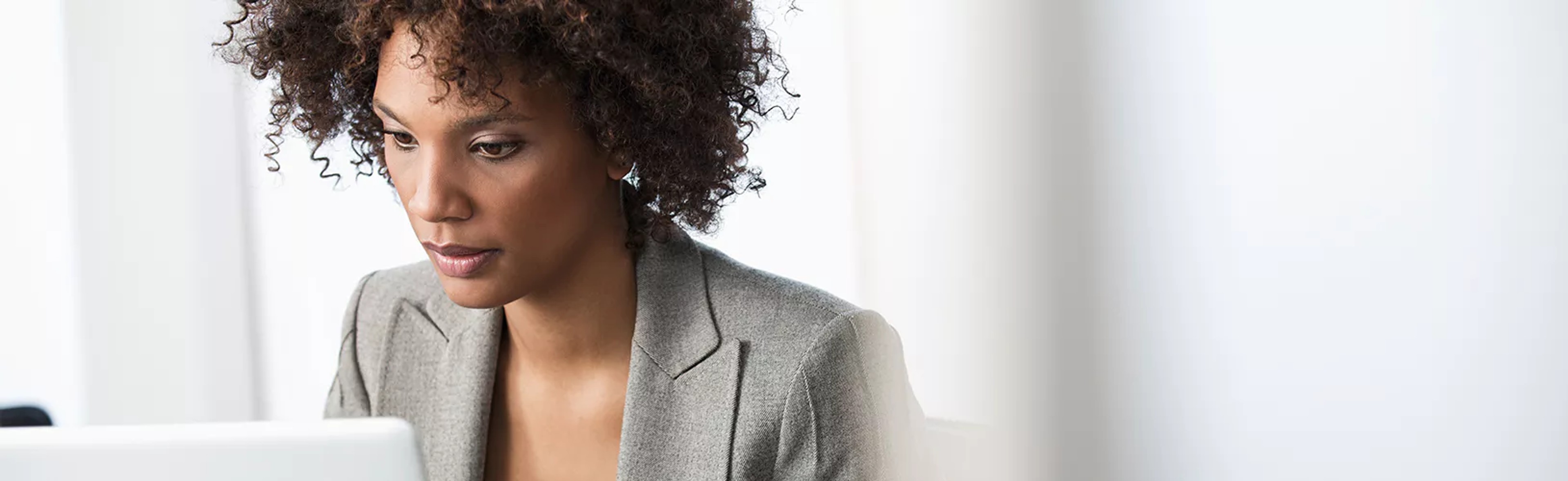 Employee researching features of conflict of interest software