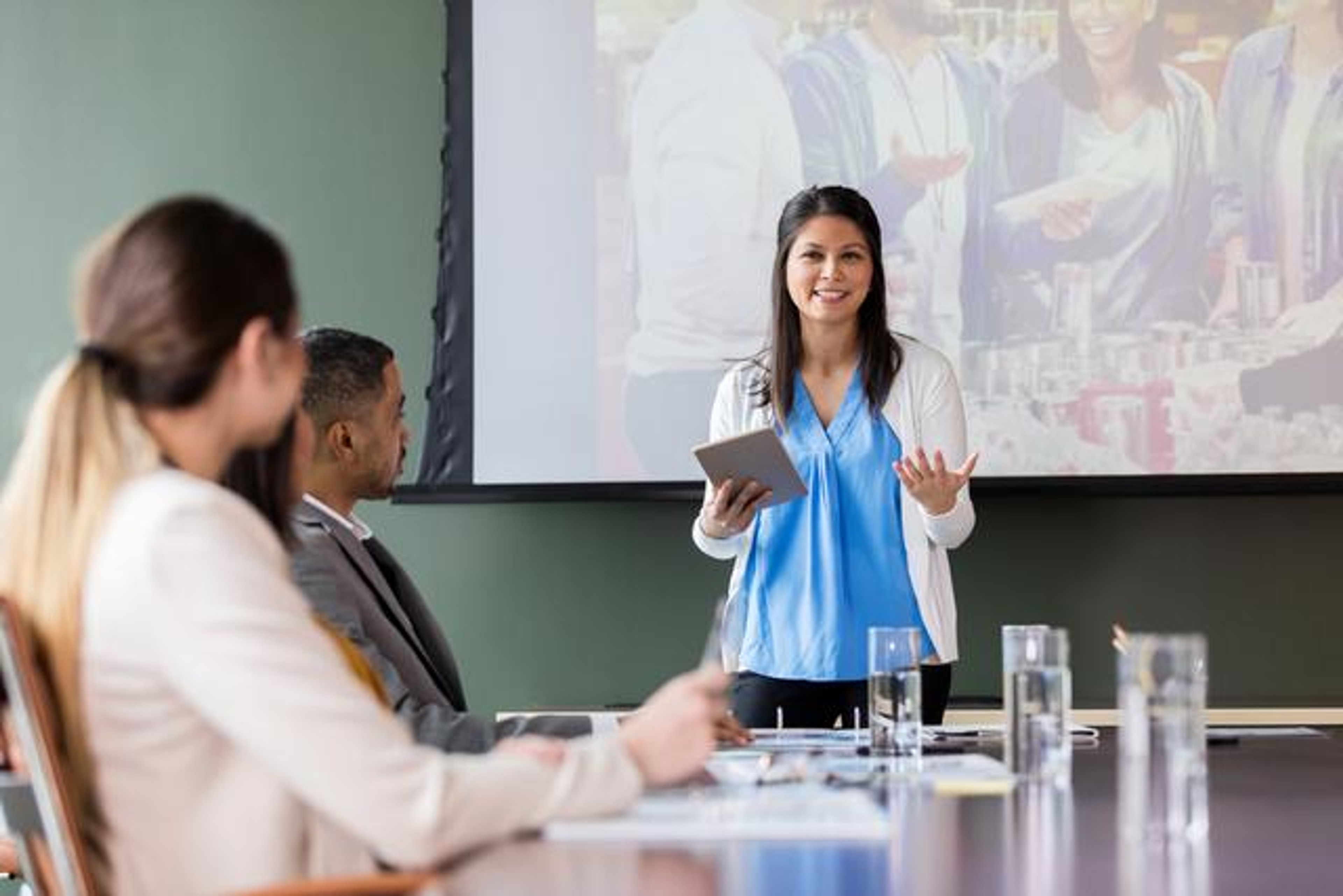 A board chair running a meeting and showing proper board meeting etiquette