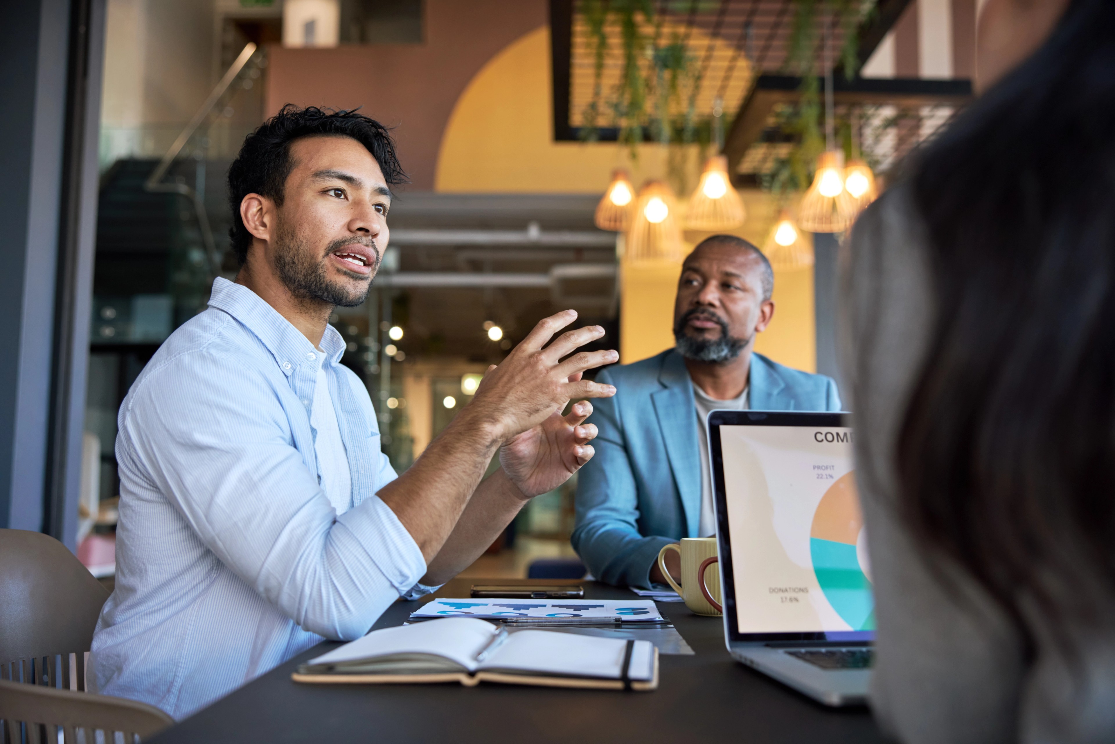 Executives discuss boardroom strategy, reflecting decisions about AI metrics and executive compensation.