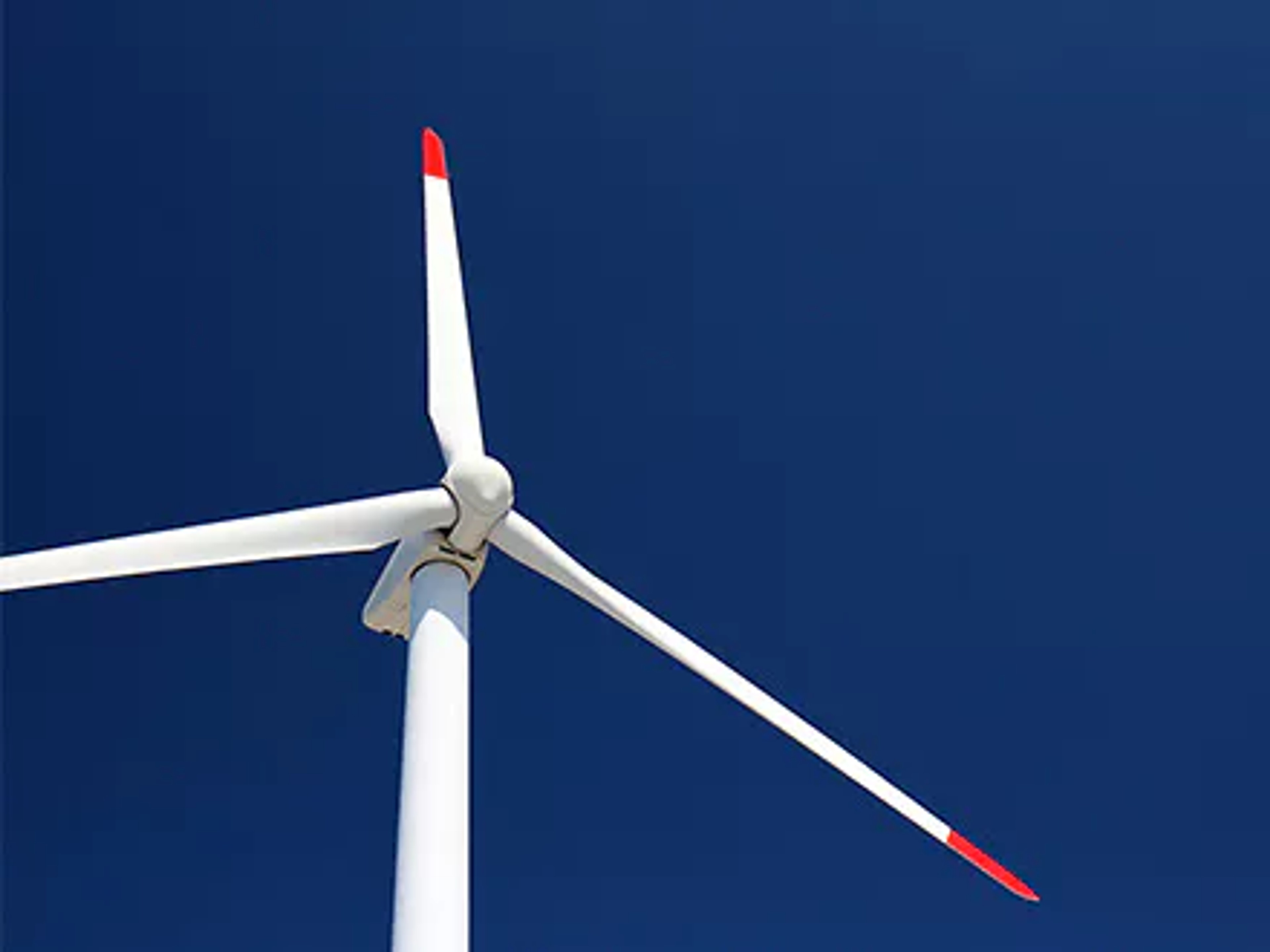 A windmill signifying how your corporate footprint relates to the impact your organization has on the environment. It is sometimes termed a company carbon footprint, environmental footprint, ecological footprint or business footprint, although there are subtle differences between them.