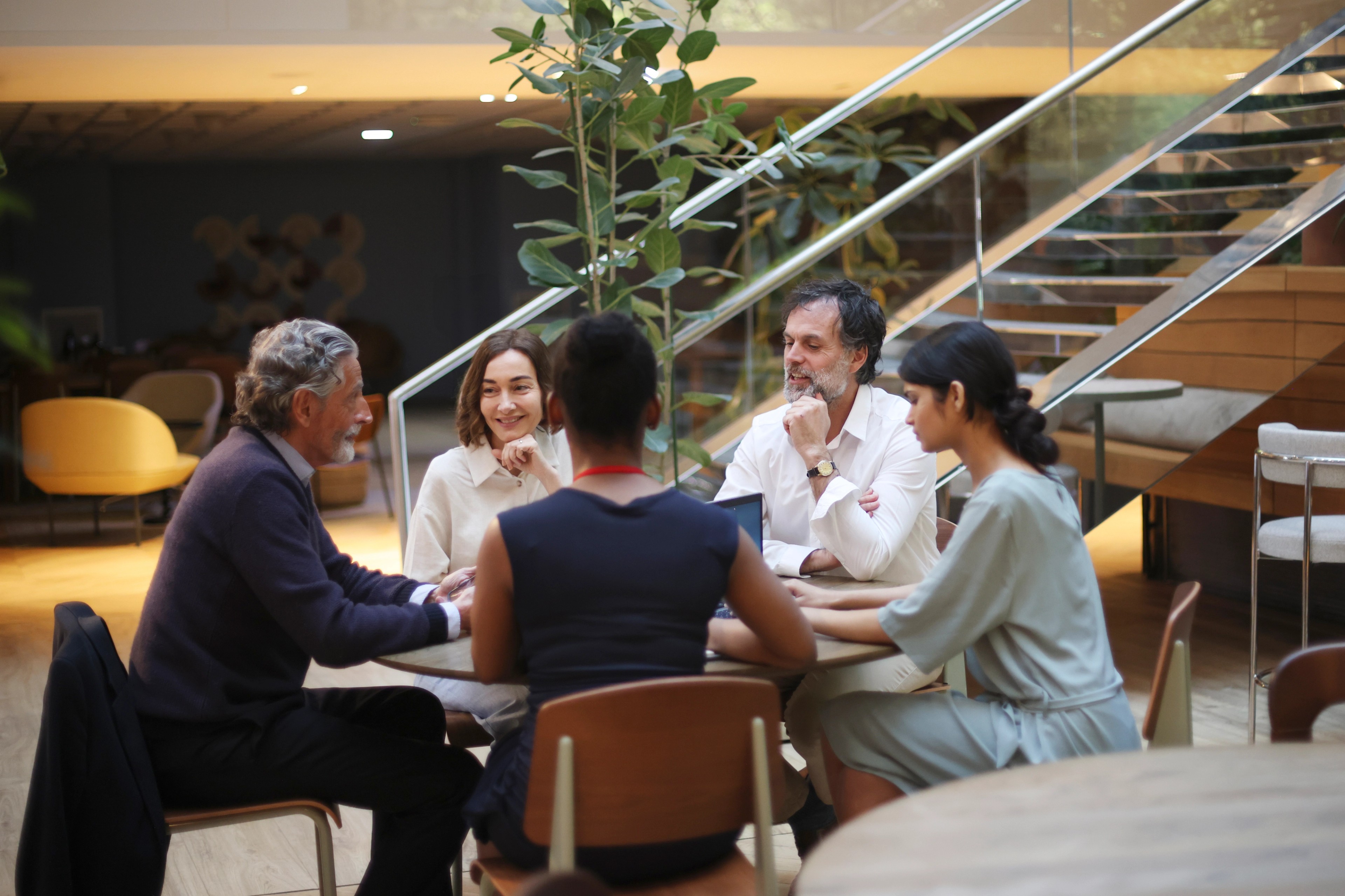 group of people discussing corporate governance report