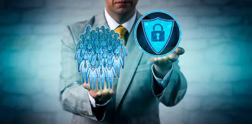 An image of a professional holding a team of people and holding a lock, signifying the role of the privacy committee.