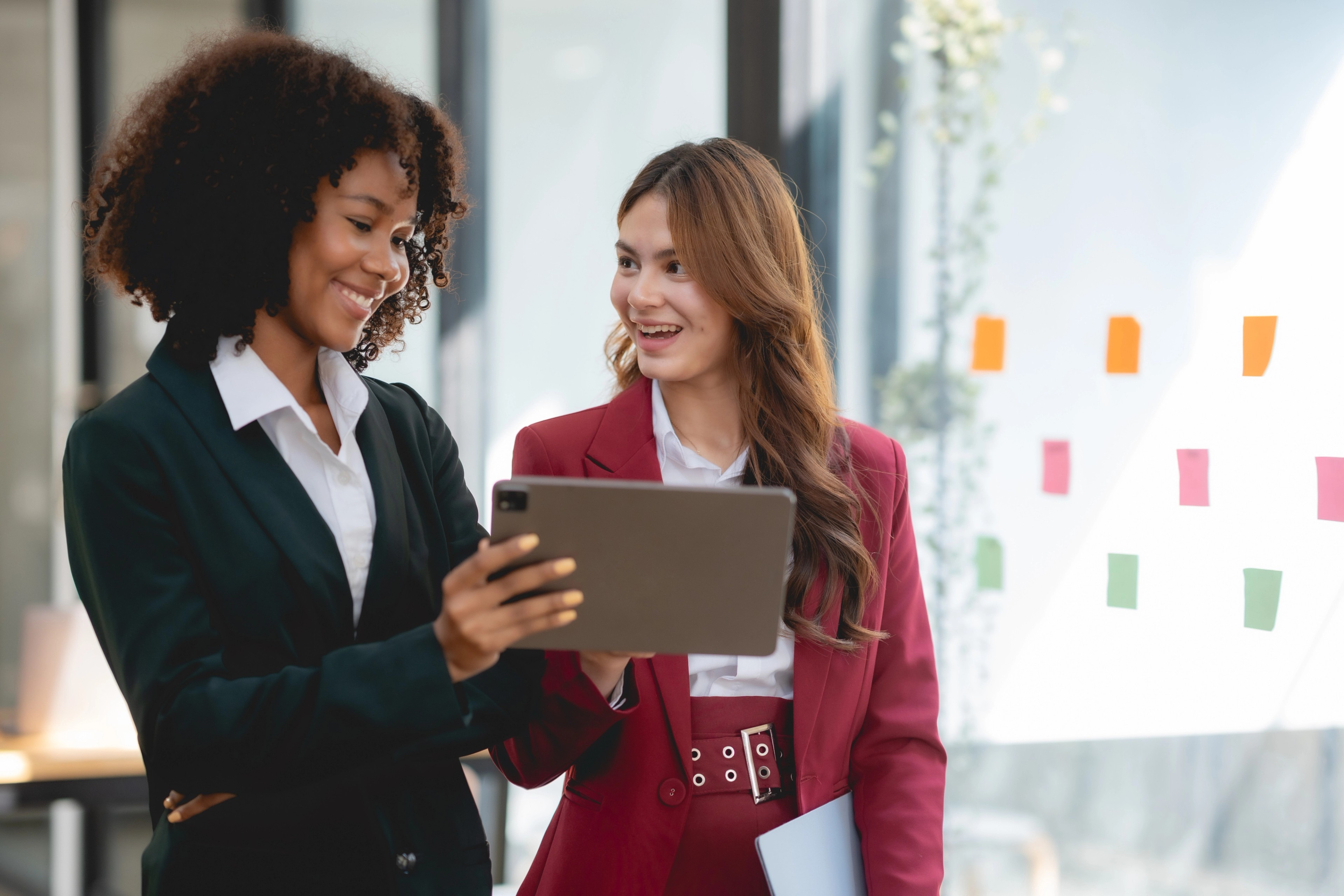 Professionals discussing a successful Diligent Boards implementation