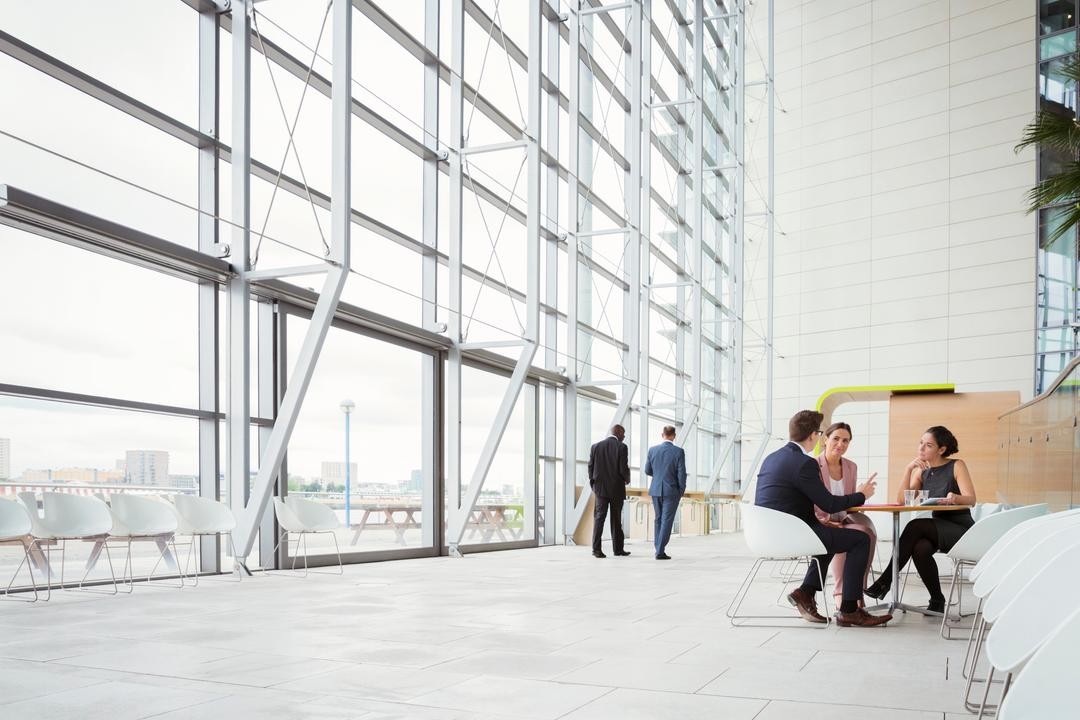 CISOs walking together and talking about reporting IT risk to the board