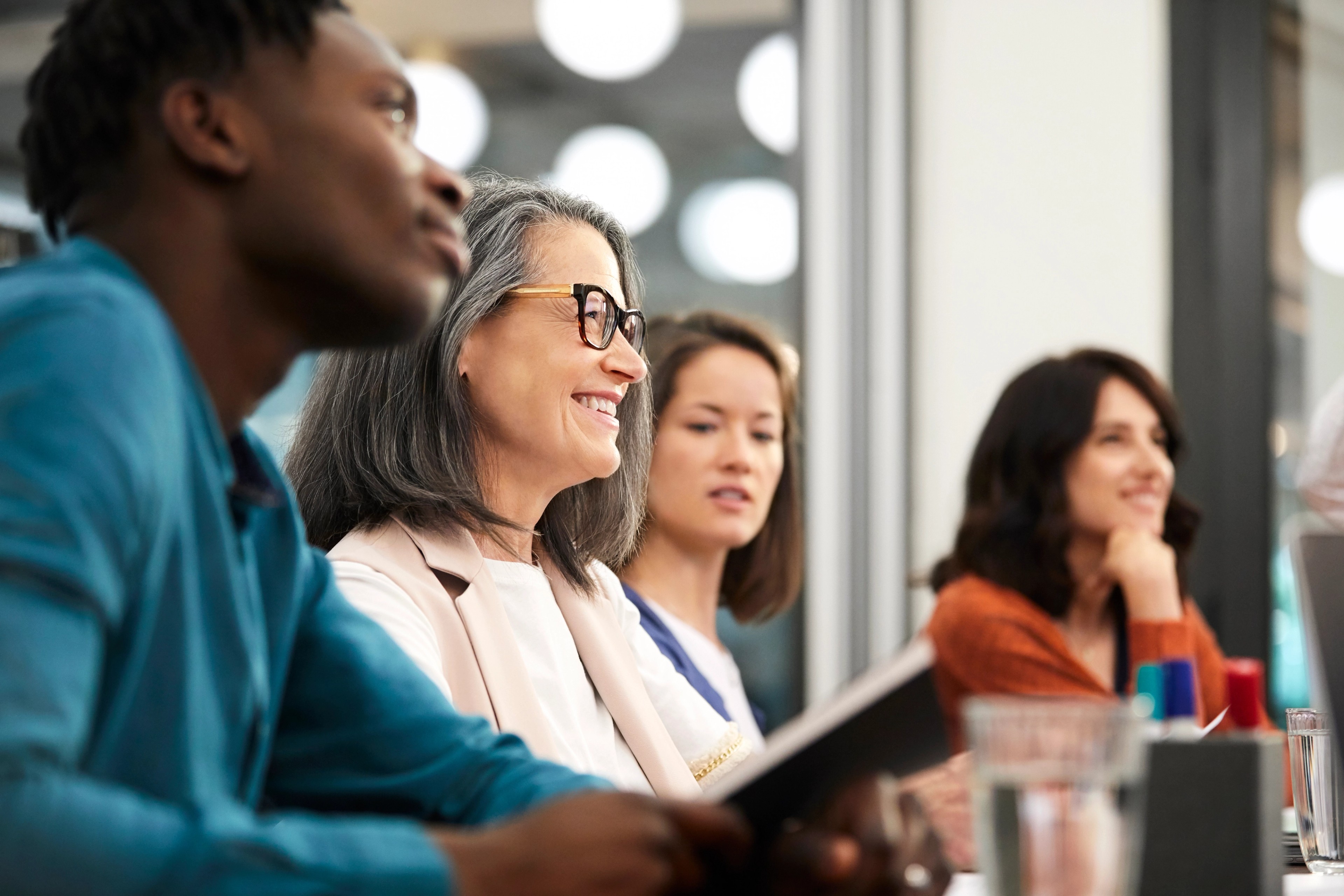 Governance professionals reviewing governance and compliance information, reflecting how Diligent Entities and Diligent Compliance help teams manage complexity with greater clarity and control.