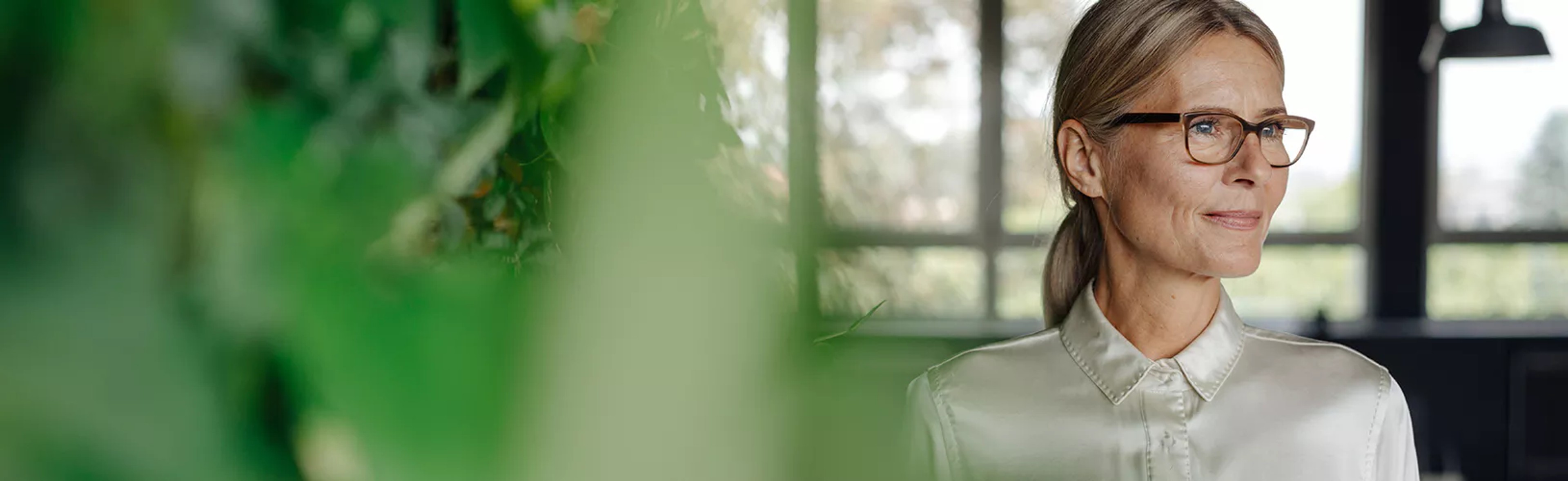 Woman considering the traditional risk management vs enterprise risk management