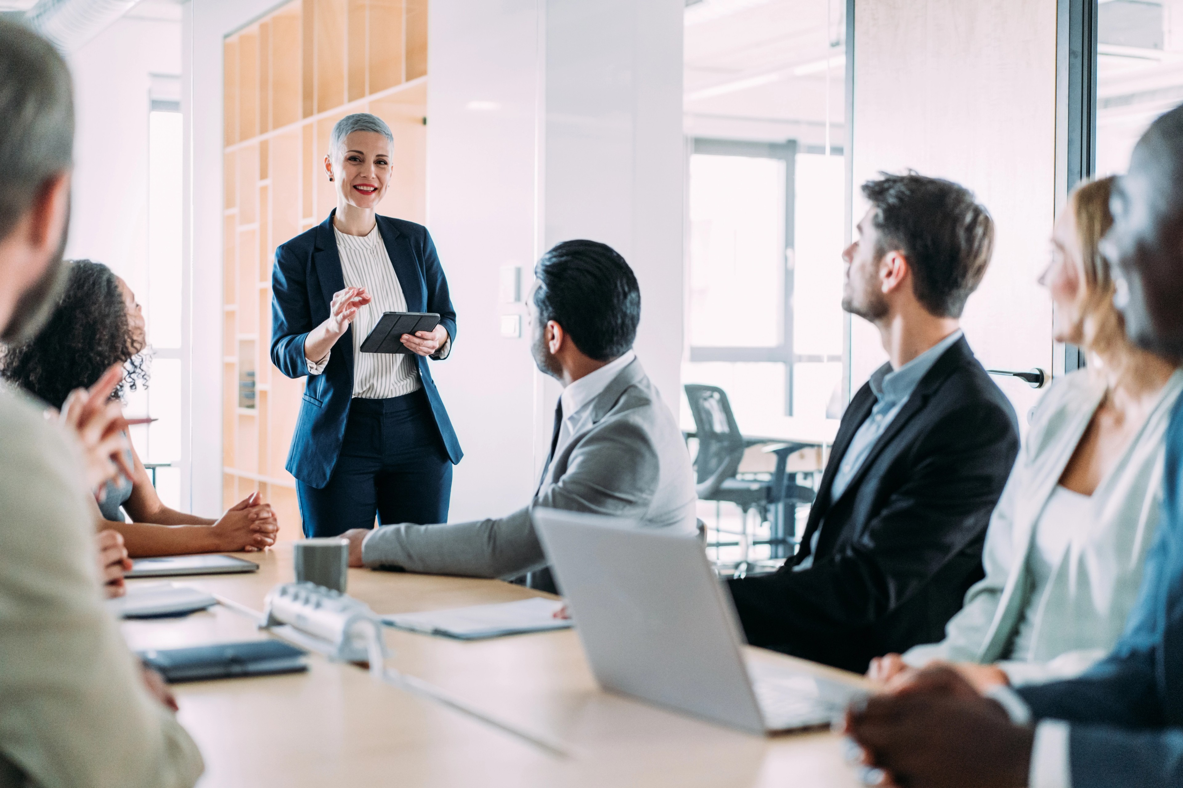 Group of business persons in business meeting