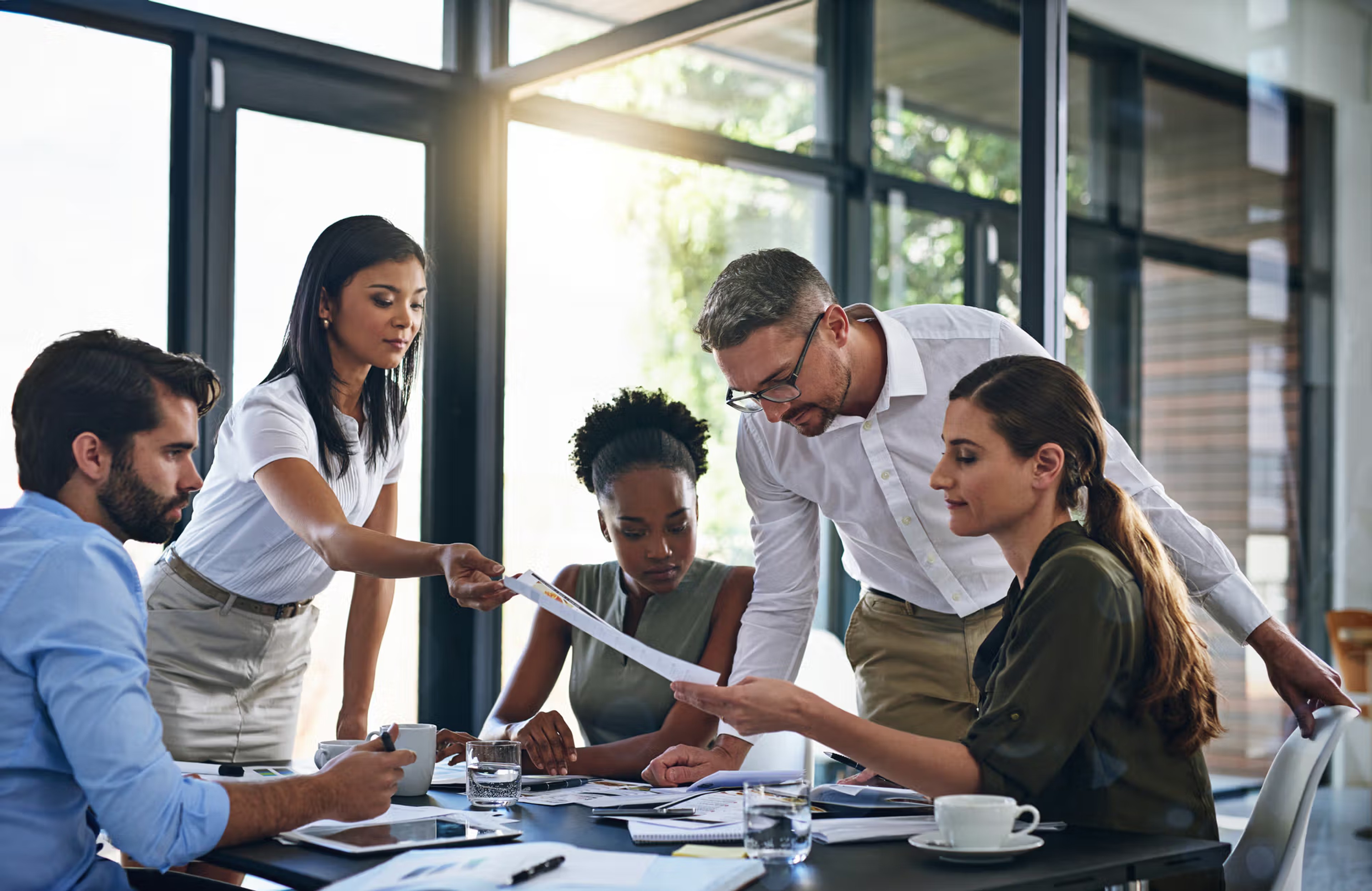 group of people discussing corporate governance report