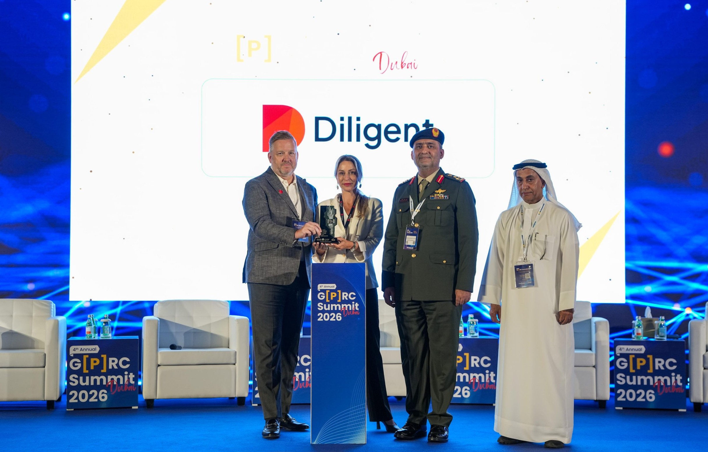 The award was presented on behalf of the UAE Government by Brigadier General Staff Ayoub Butti Al Falasi and accepted on behalf of Diligent by Narimane Kurdi, Director of Revenue Marketing, and Paul Skerratt, RVP of Sales UAE.