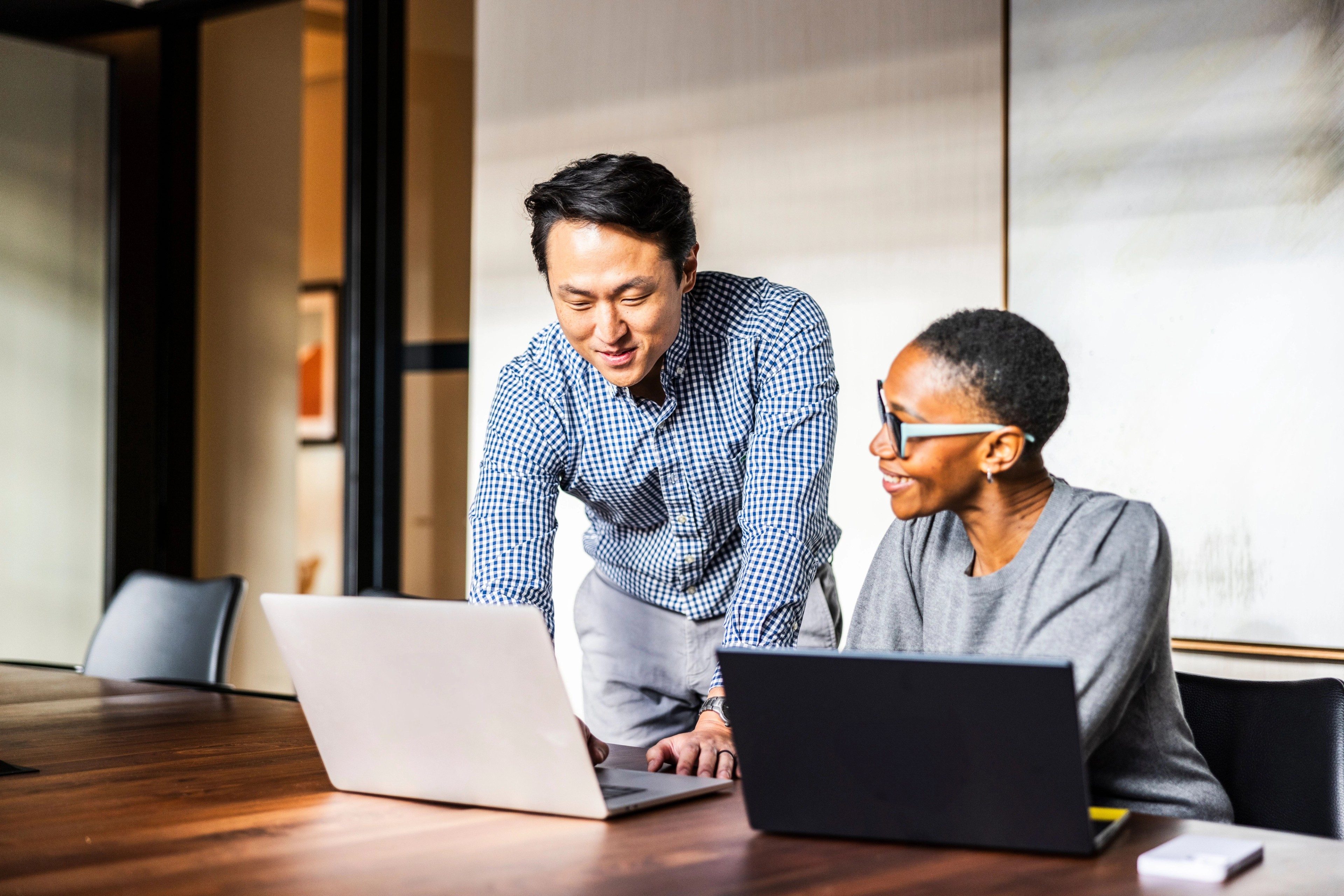 two colleagues on laptop