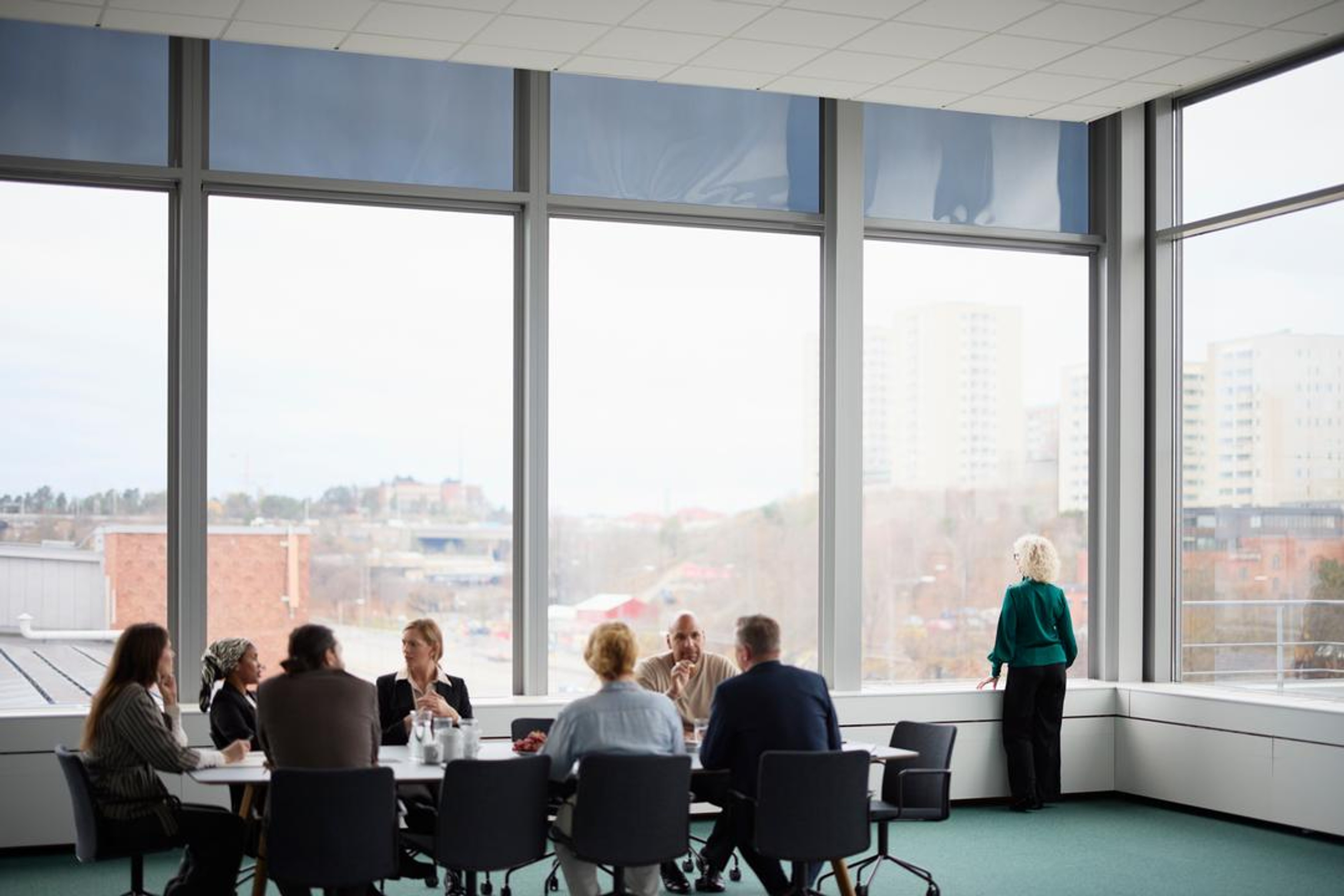 A board meeting being held to plan ahead of boards and governance trends for 2025
