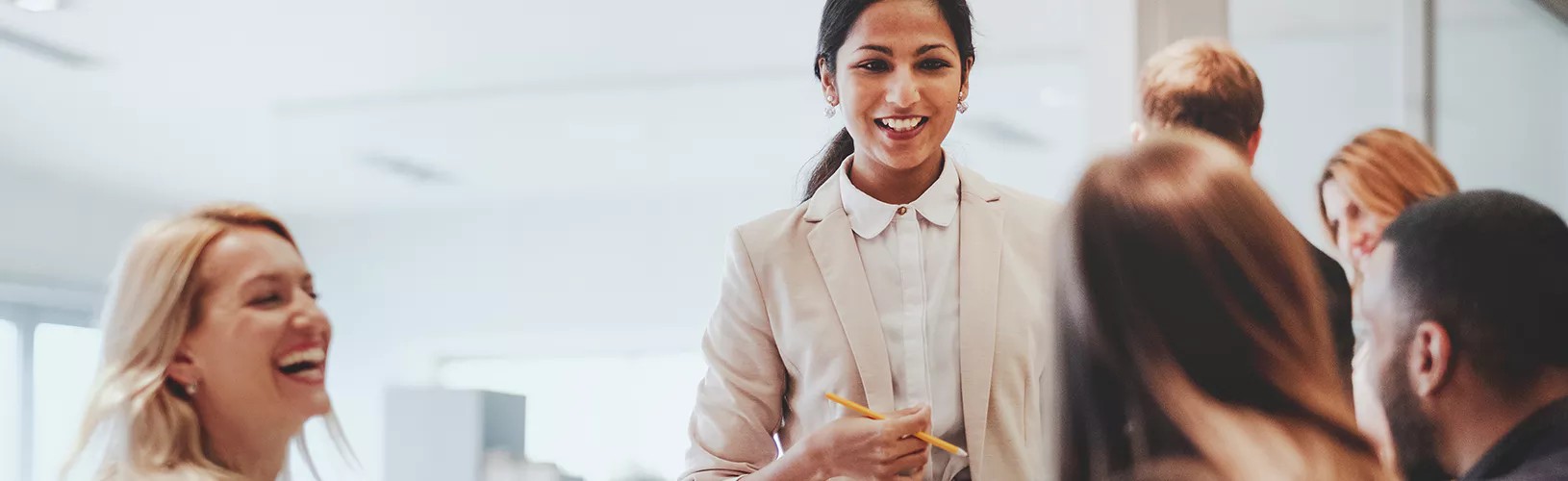 Professionals discussing boardroom gender diversity.