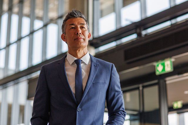 A member of the board reviewing a compliance as part of board oversight of risk management