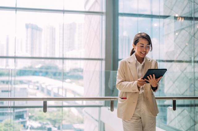 A corporate secretary preparing to sign a board resolution