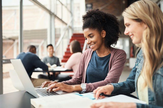 Board members using Diligent AI to make board pack creation easier