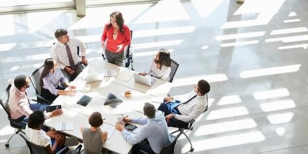 Board members delivering an effective boardroom presentation in accordance with the corporate governance best practices