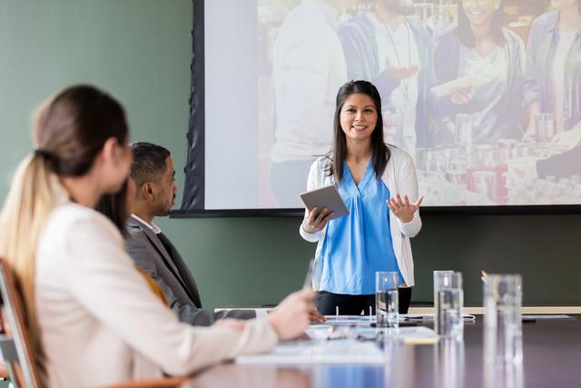 A board chair running a meeting and showing proper board meeting etiquette