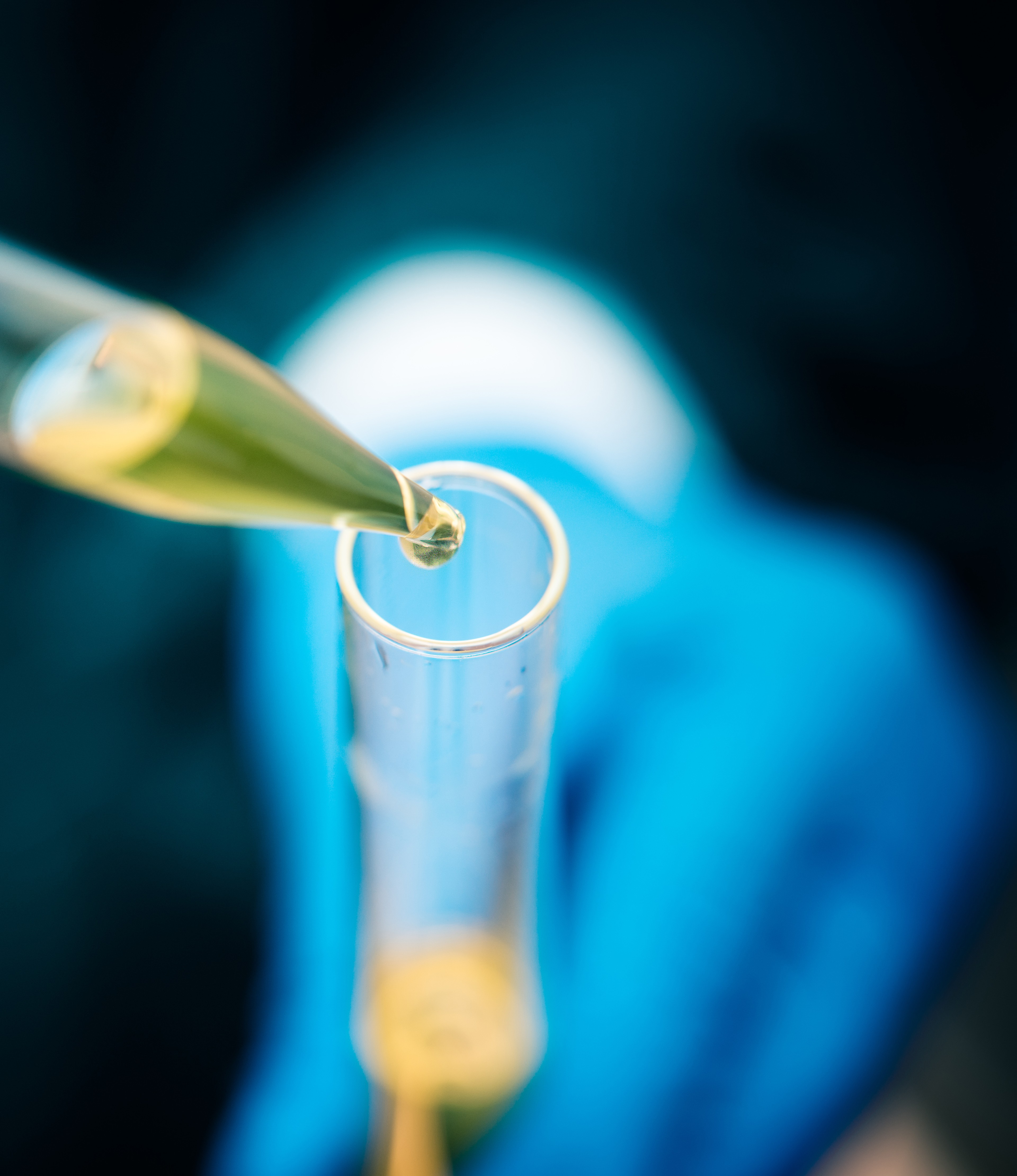 Dropping liquid into a test tube