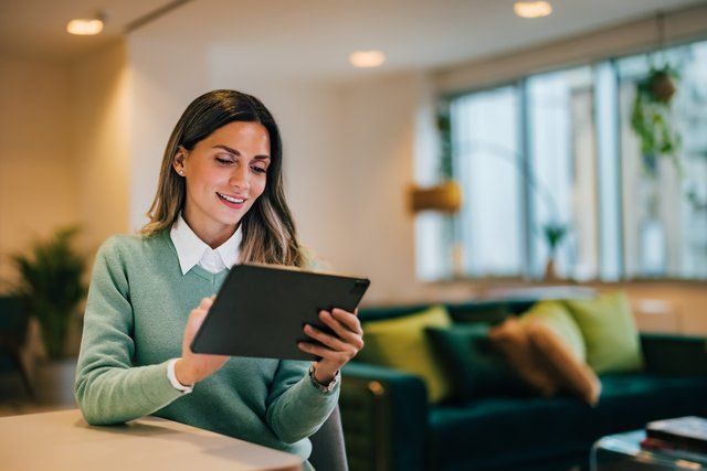A general counsel viewing Diligent's global compliance outlook guide to help them with the NIST AI Risk Management Framework