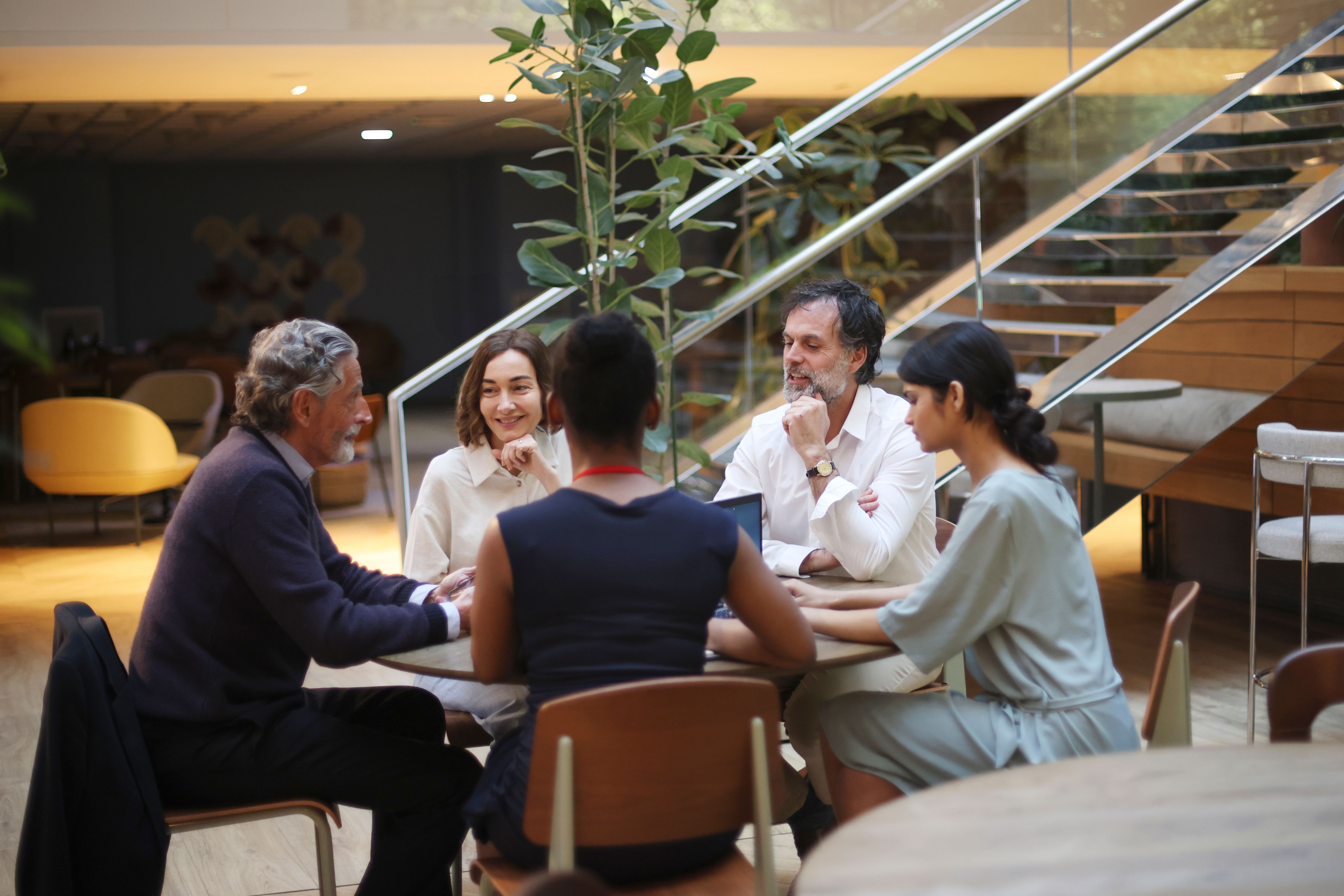 group of people discussing corporate governance report