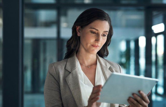 An internal auditor viewing how audit technology can help with the 4 types of audit reports