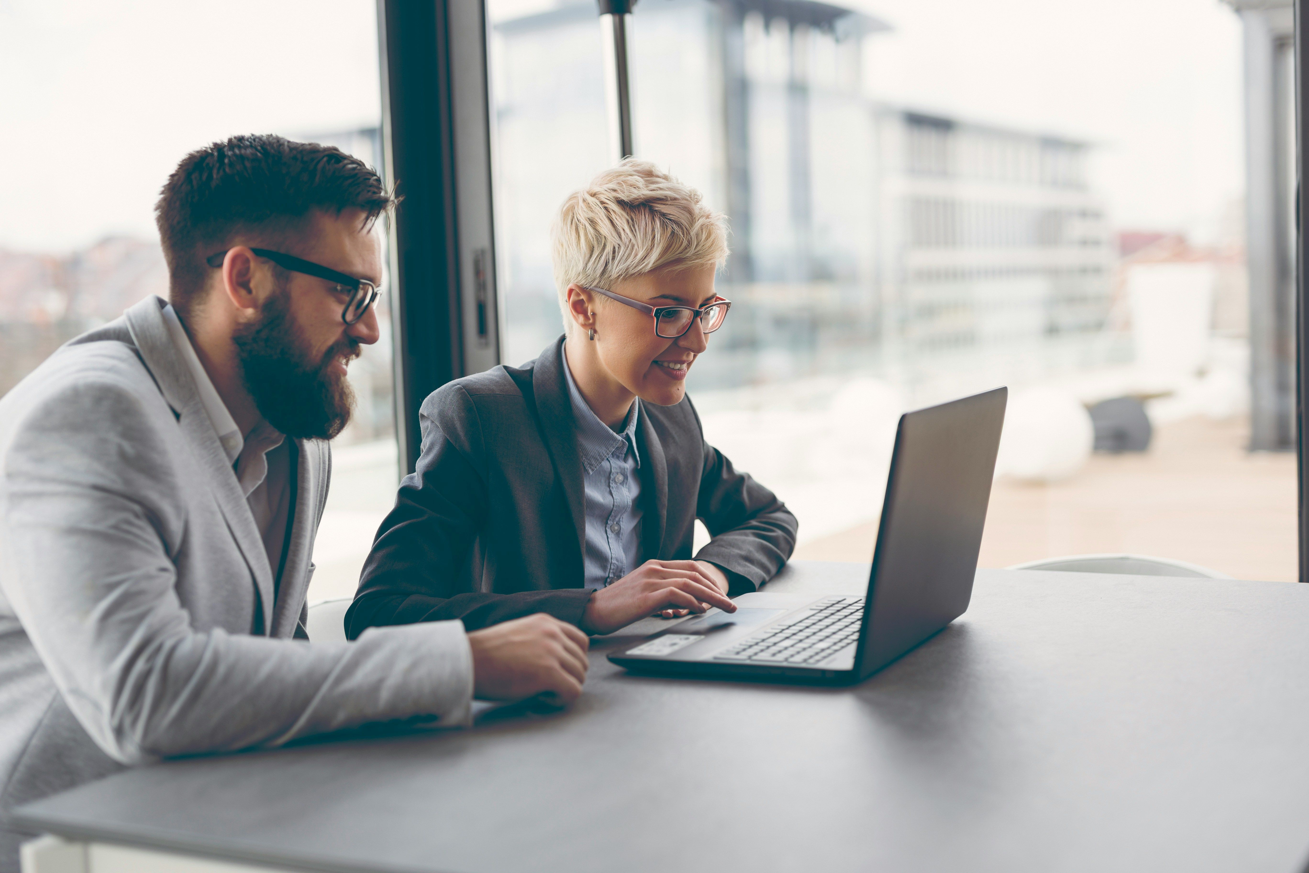 Team mates performing continuous risk monitoring