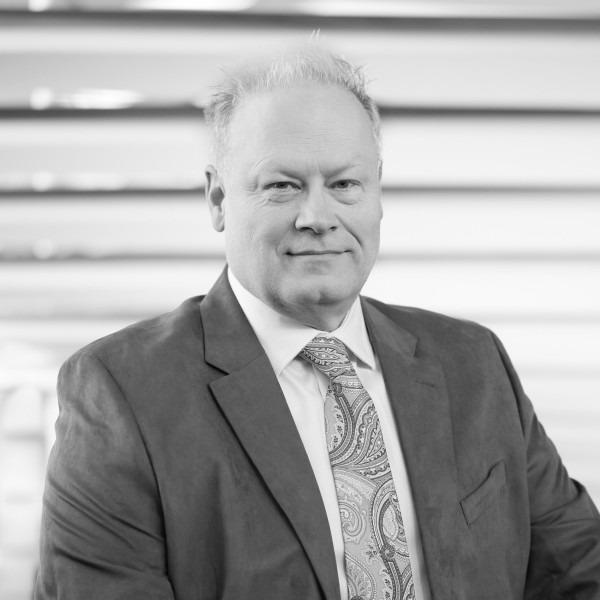 John Tolbert headshot black and white