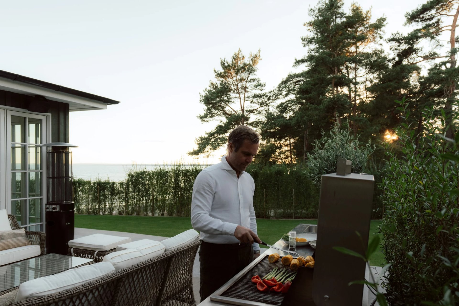 Food cooking on the outdoor grill at Villa Sand