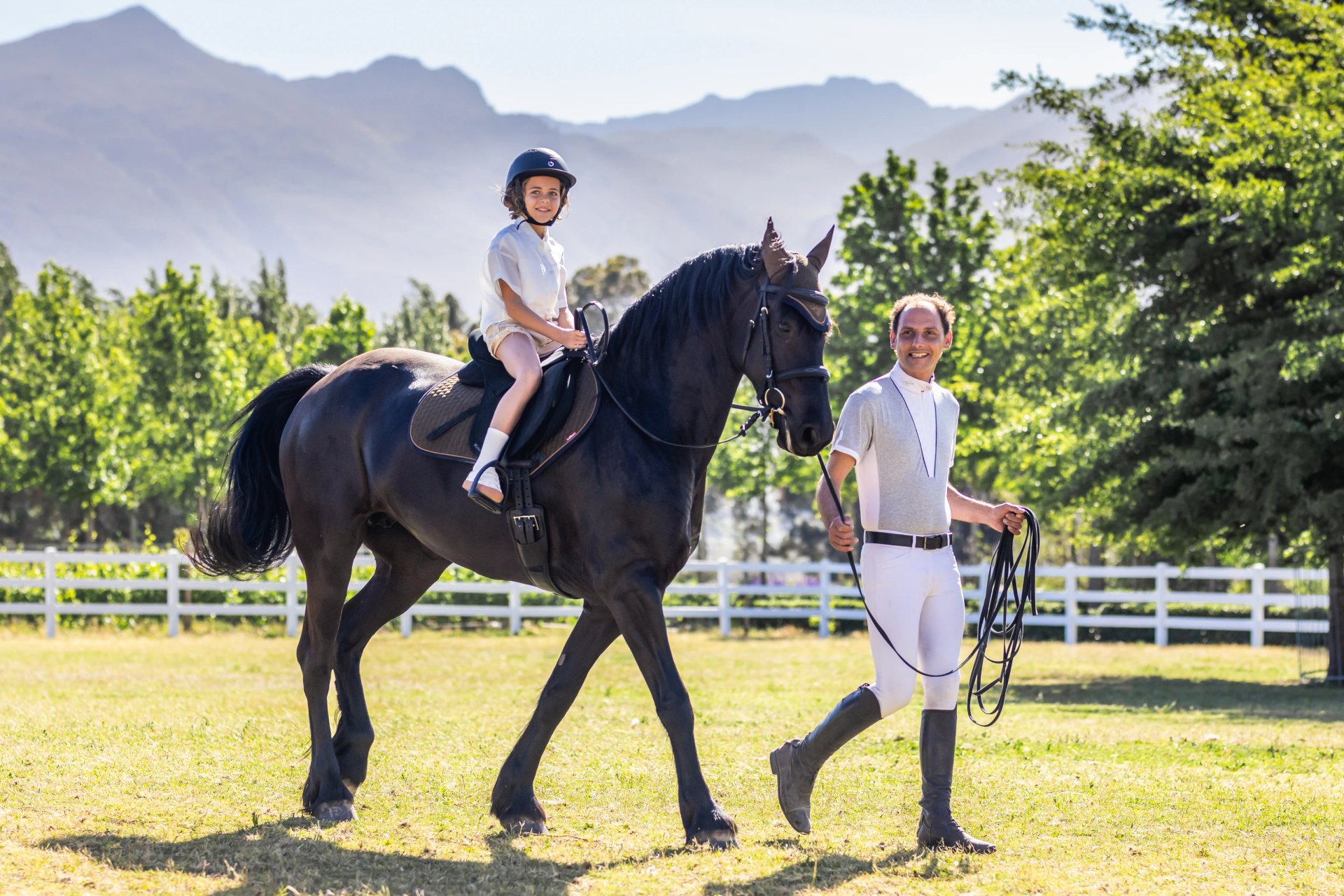 Guided horse ride with mountain backdrop
