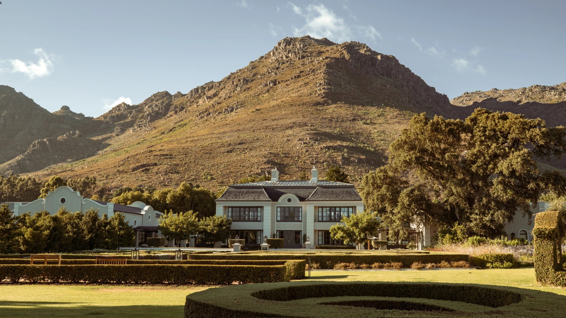 Oakvale Estate manor and formal gardens beneath the mountain