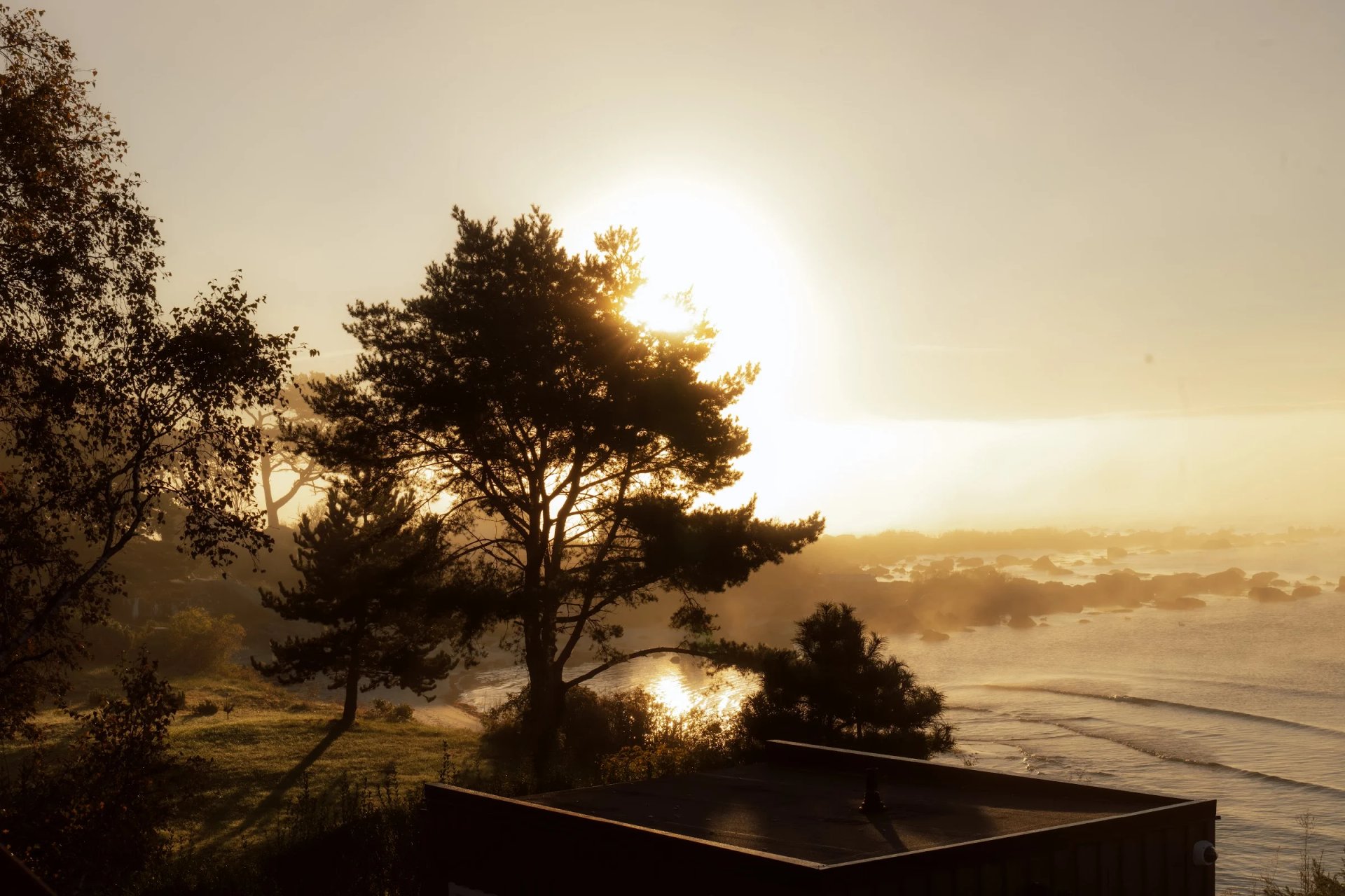 Morning sunlight and sea mist around Villa Sand’s terrace