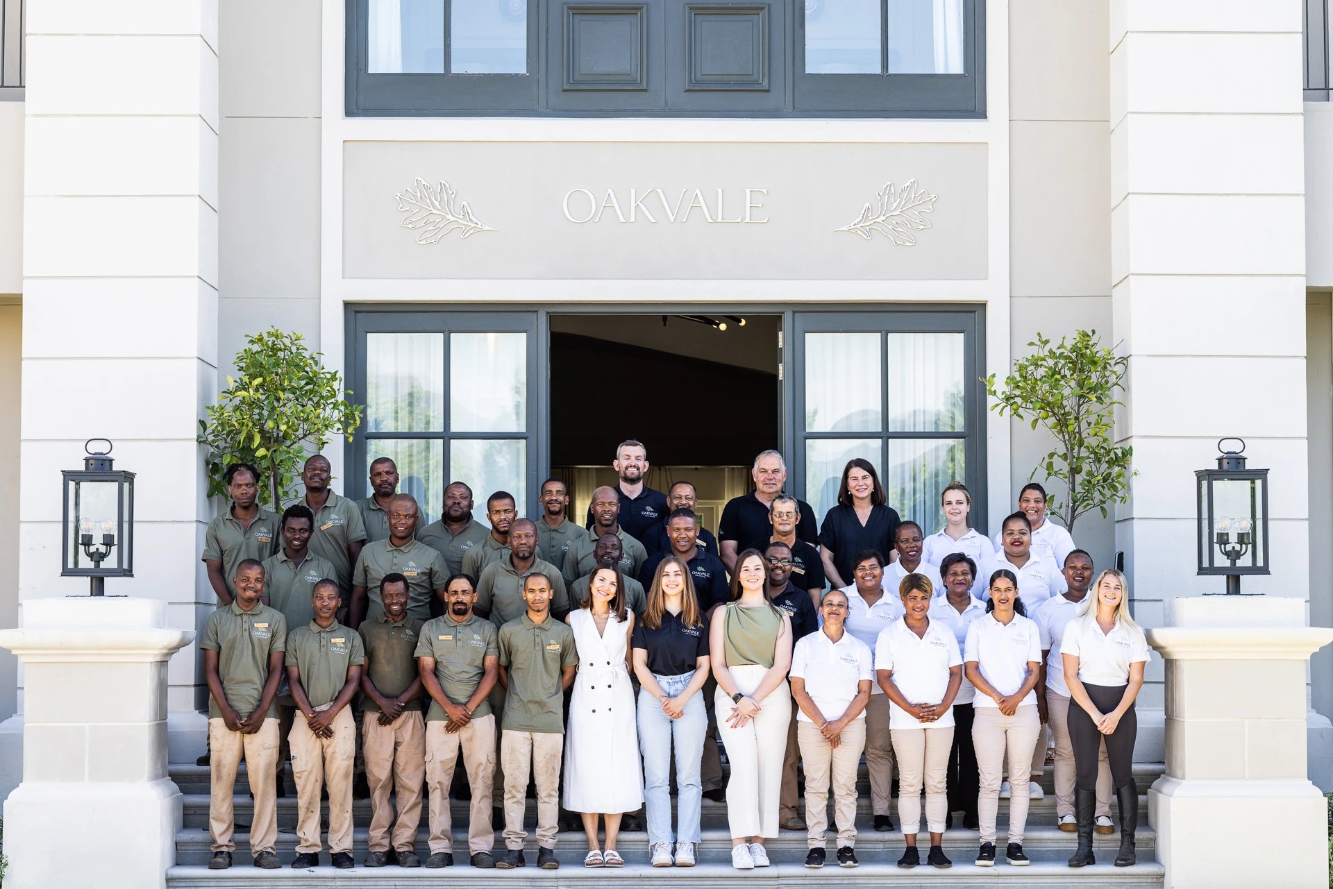 Oakvale team on the entrance steps
