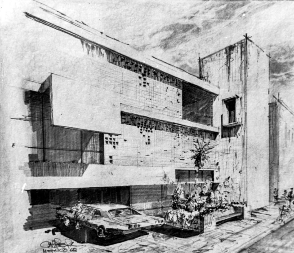 Perspectiva de un edificio con celosías y jardineras