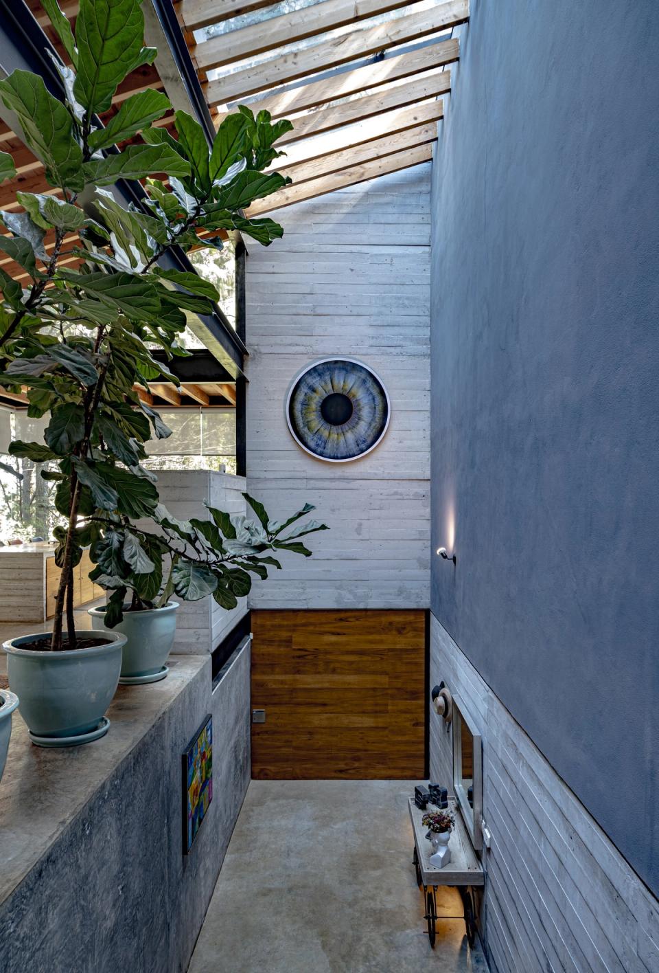 Doble altura con planta y ventana circular