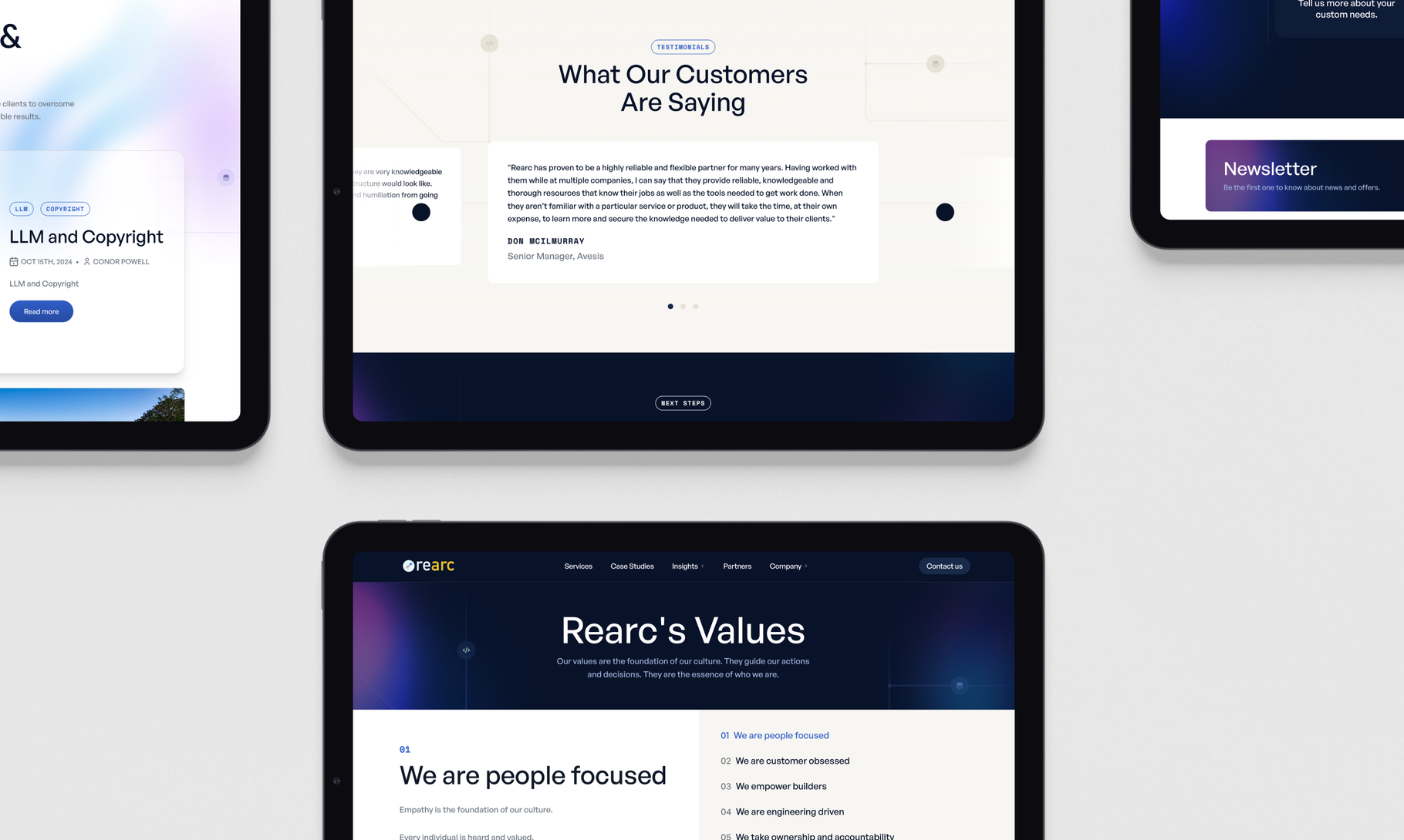 Multiple tablet screens display a modern website interface featuring customer testimonials and company values with a dark blue gradient design theme.