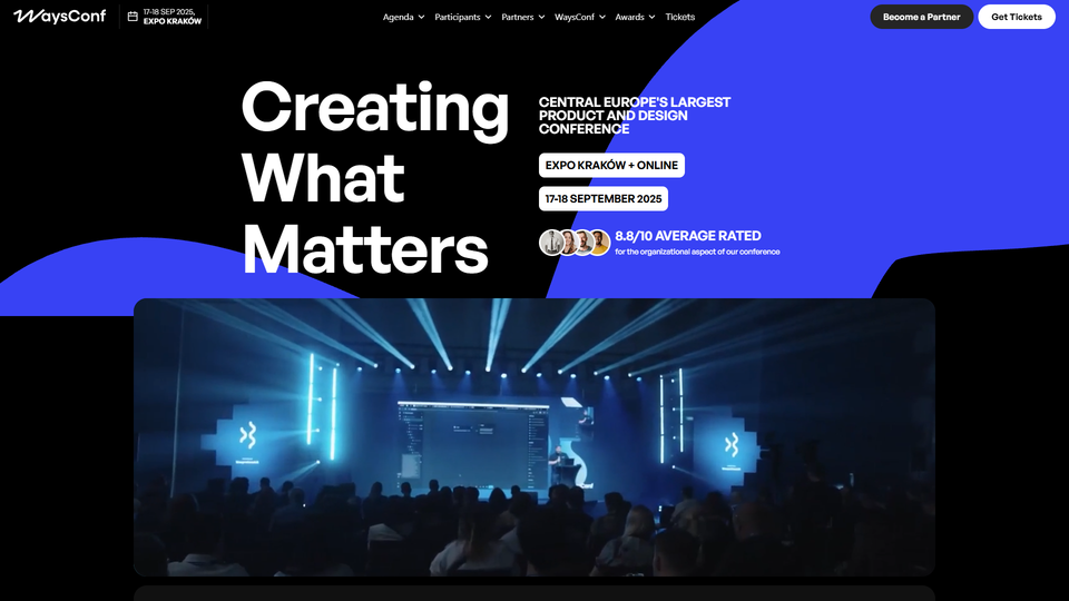 Central Europe's largest product design conference "Creating What Matters" features a dramatic stage setup with neon lighting and a packed audience at EXPO Krakow in September 2025.