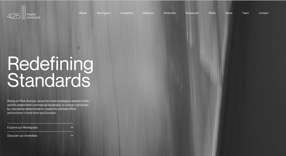 A modern website header for 425 Park Avenue features "Redefining Standards" as its tagline against a grayscale abstract background with navigation menu options.
