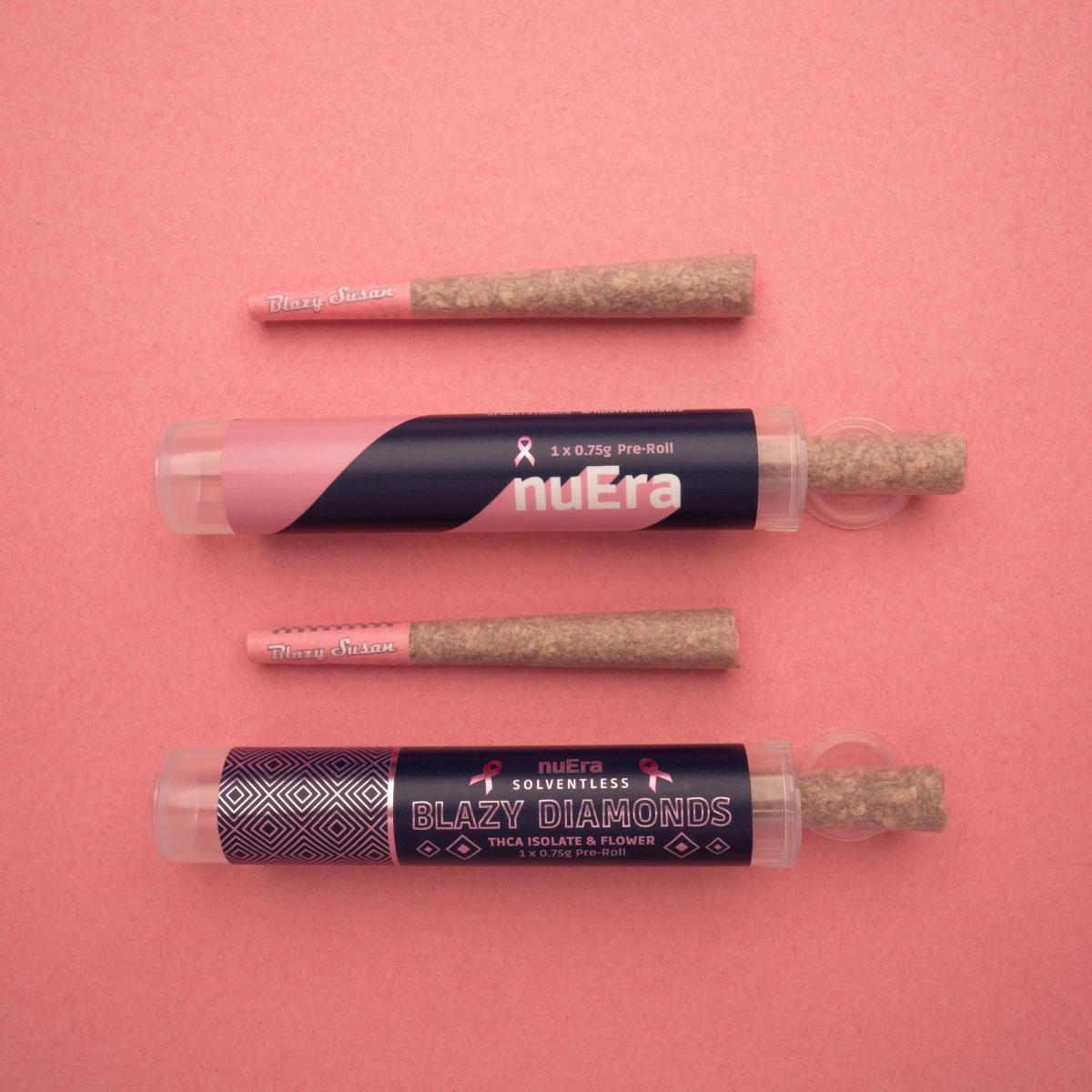 Two nuEra pre-roll tubes and pink-tipped pre-rolls on pink