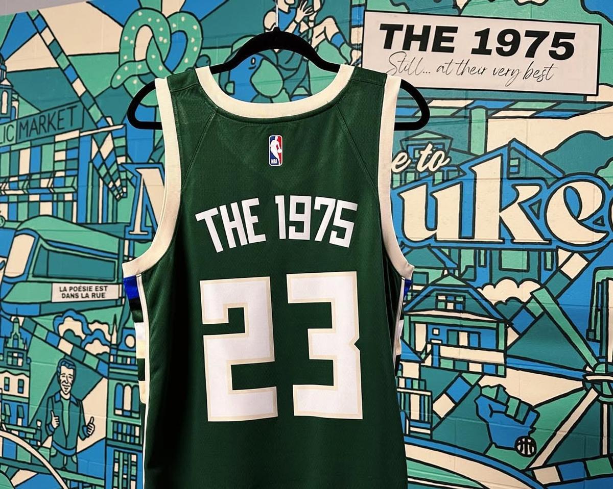 A custom The 1975 Bucks jersey hanging on the Welcome to Milwaukee mural