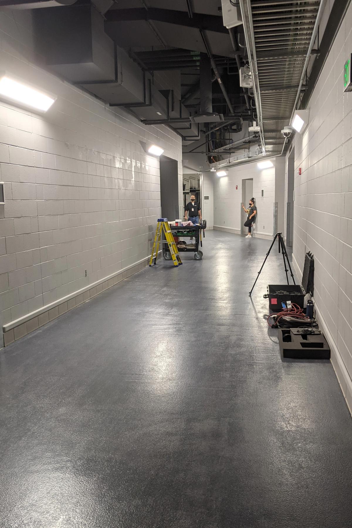 The empty Fiserv Forum hallway before the mural was painted