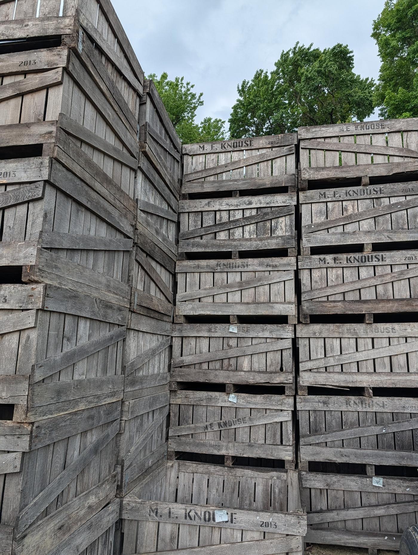 Wooden apple bins stacked high