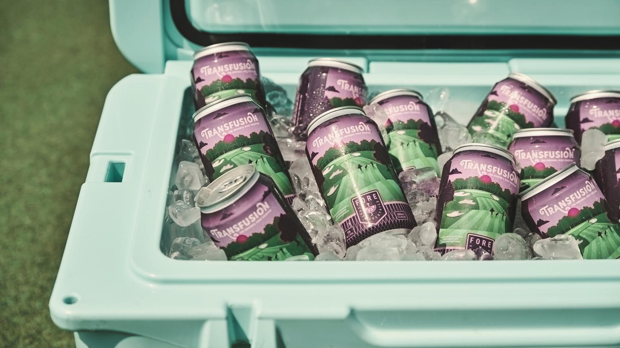 FORE Craft Cocktails cans on ice in a golf cooler