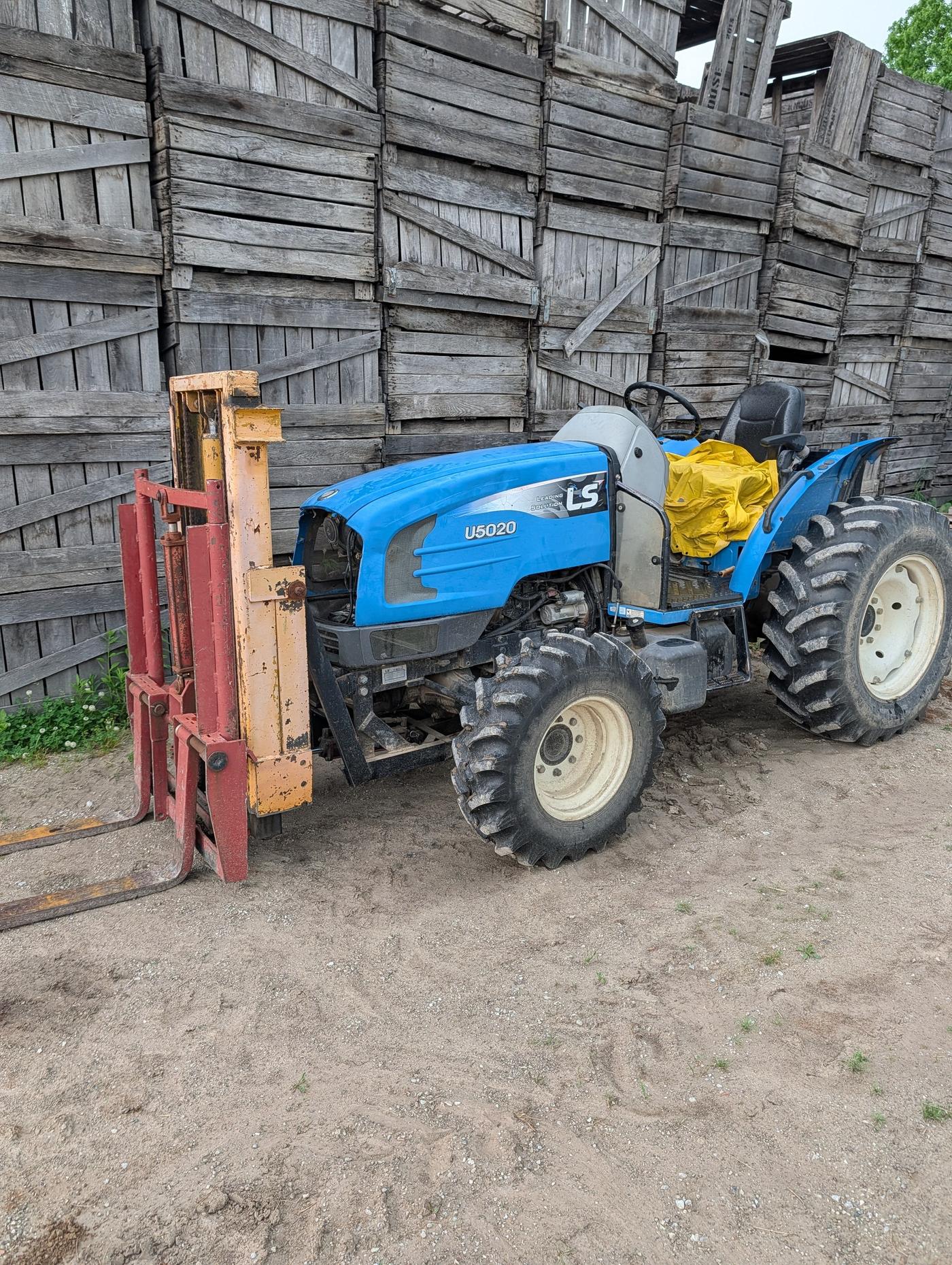 A tractor with a bin lift