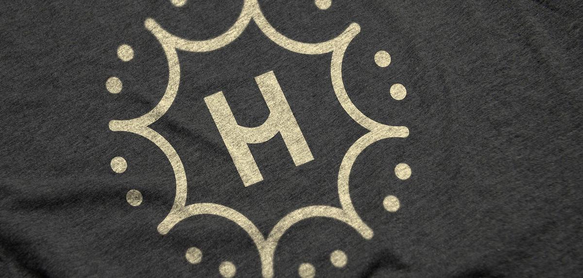 Happie logo printed on a grey T-shirt