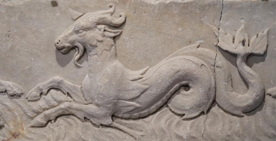 Triton Riding the Waves
