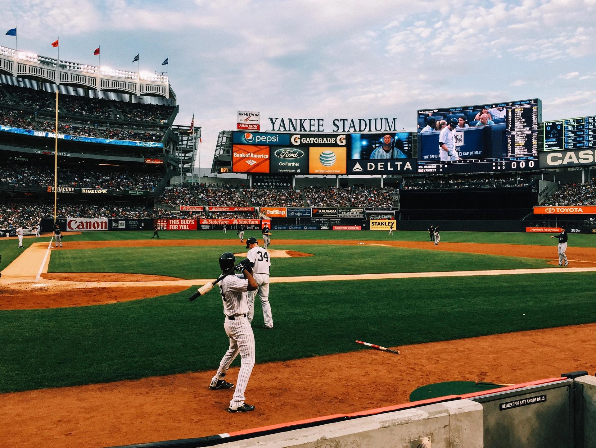 Baseball players warming up at Yankee Stadium