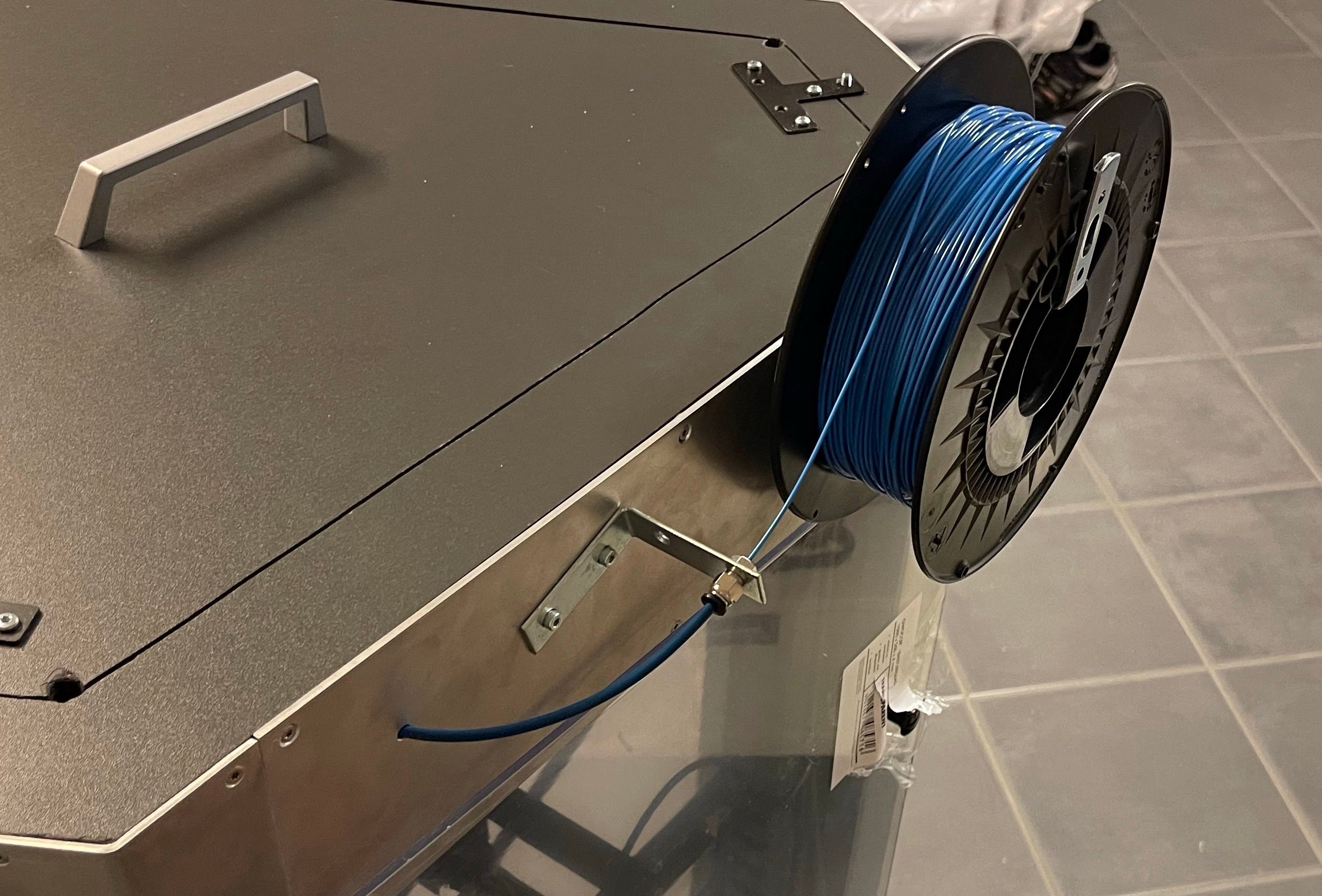 Cover and material feed