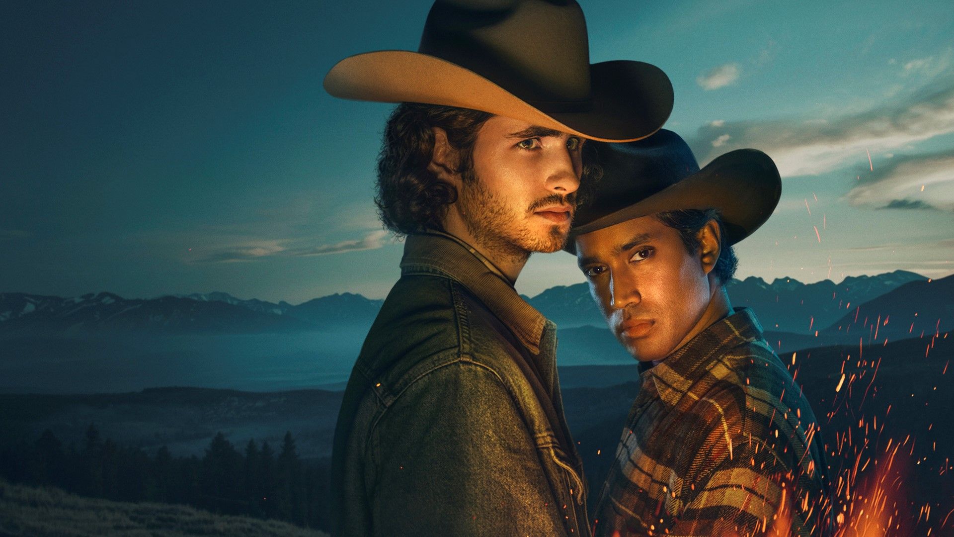 Manérbild Brokeback Mountain – teaterföreställning med musik, två män i cowboyhattar i ett dramatiskt bergslandskap