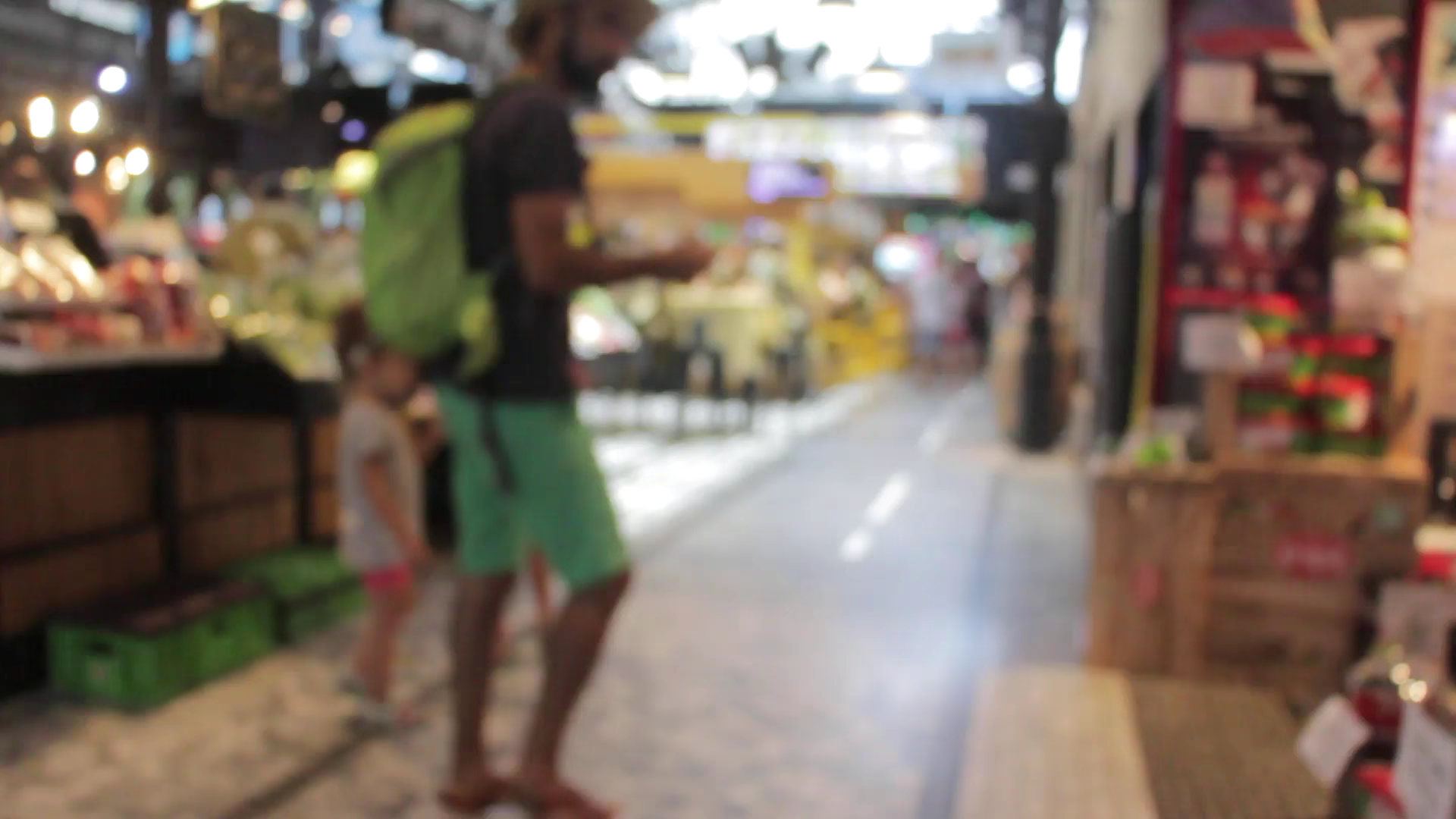 First frame of the ALLY video showing a retail venue.